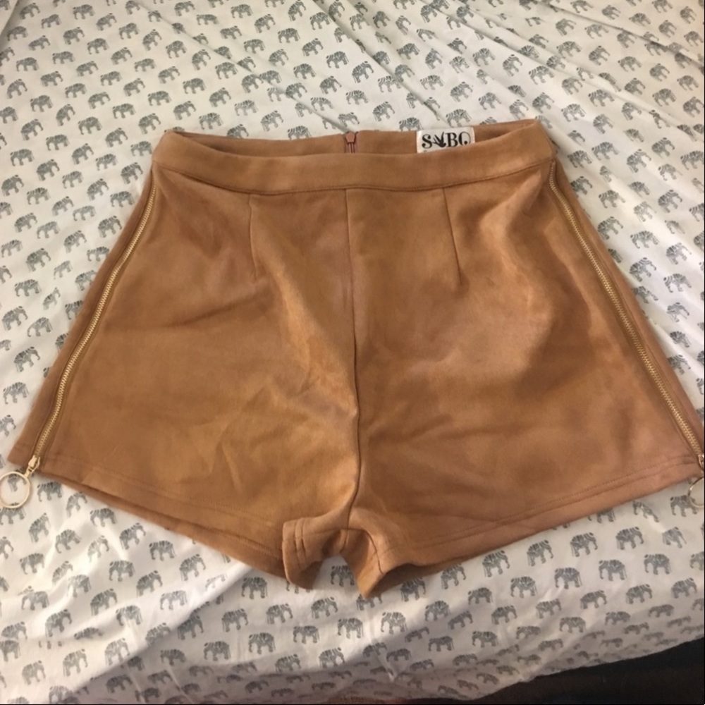 Faux suede shorts with zip up sides